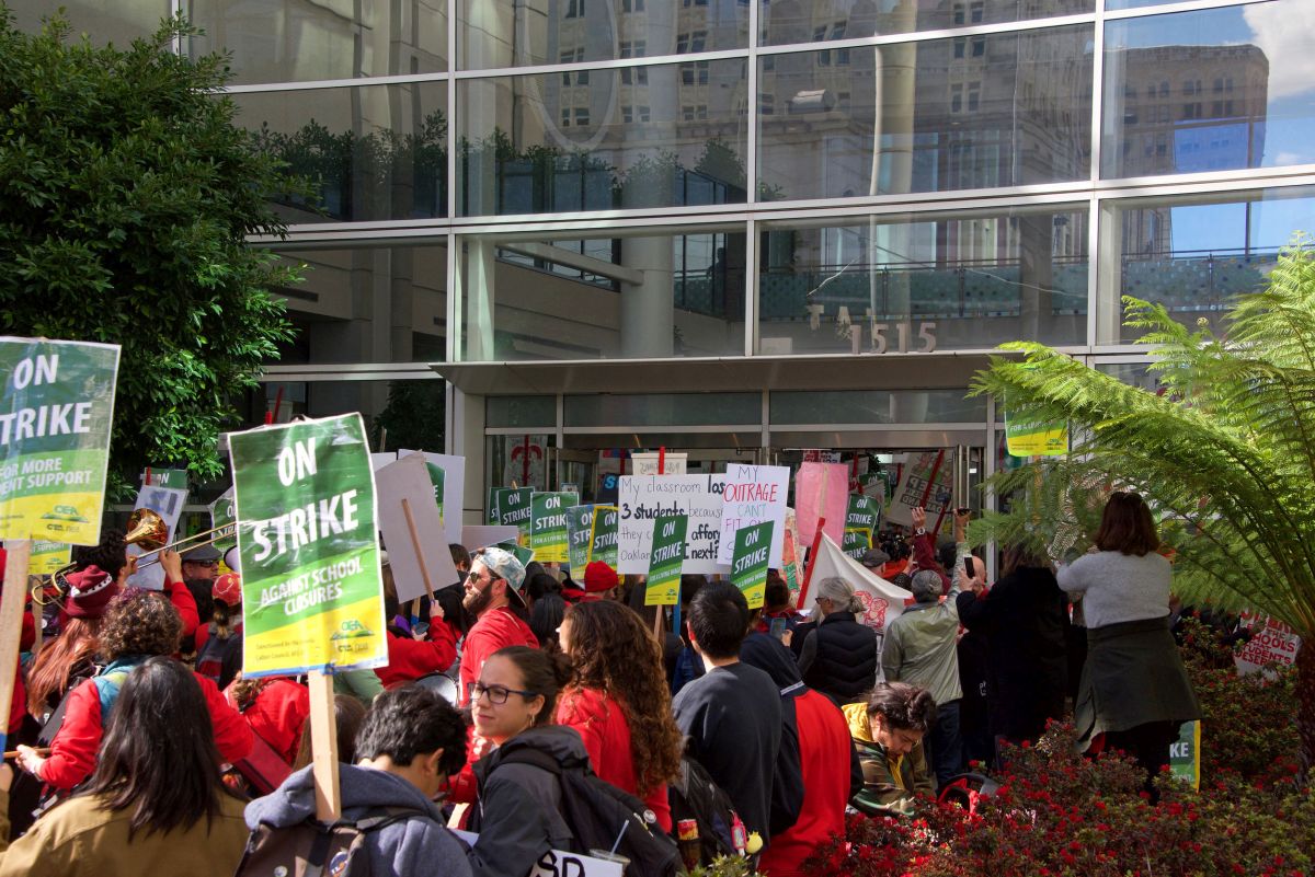 Oakland, CA - February 28, 2019: Unidentified participants at Oakland teachers strike day 6 rallying at Frank Ogawa Plaza downtown. Fighting for smaller class sizes and bigger paychecks.