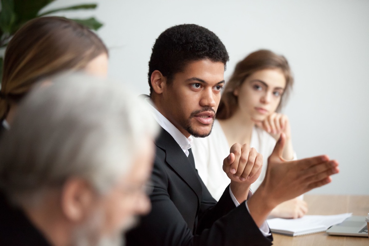 black leader talking delegating work; union response concept