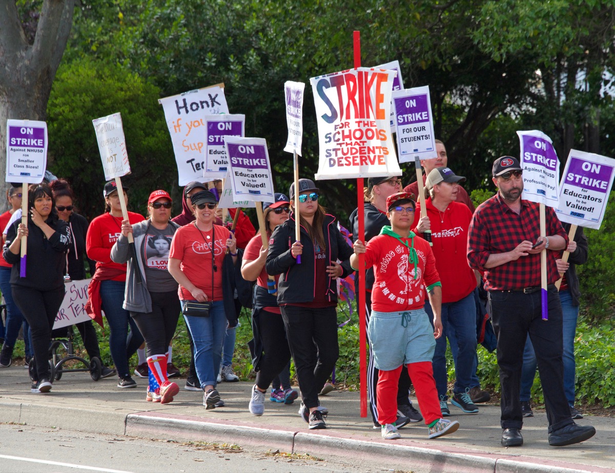 Teachers and students march; teachers strike; teachers union