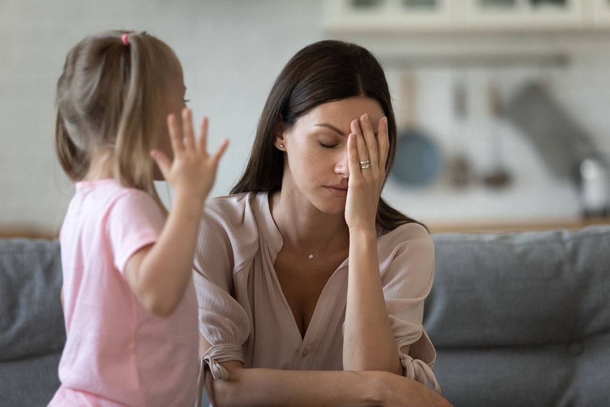 tired working mom with child
