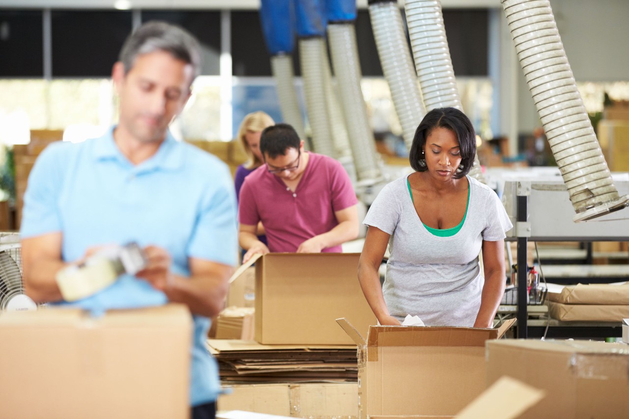 warehouse worker box products; alabama amazon union concept