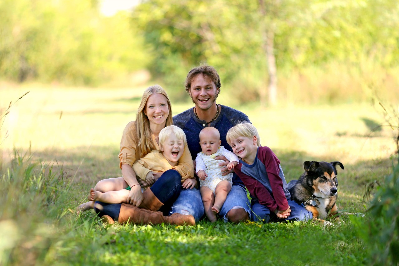 smiling family; unions and paid family leave concept