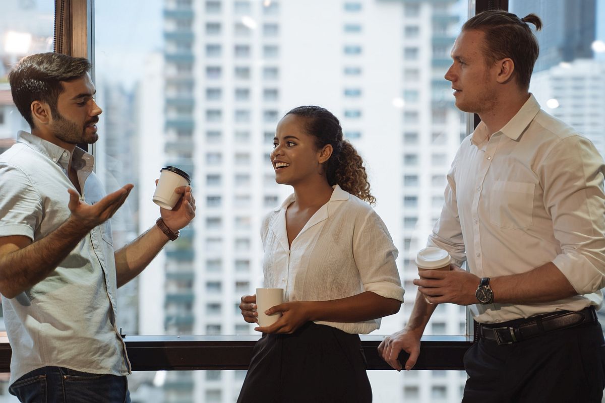 Three professional people talking; NLRB certification concept