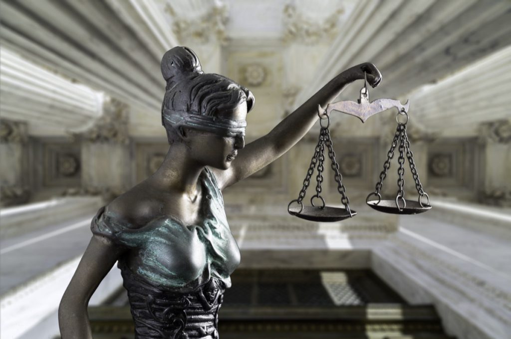 Lady Justice at Supreme Court; federal initiatives concept