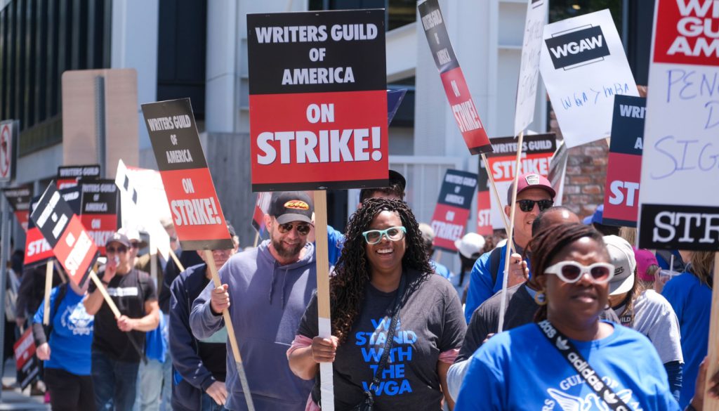 WGA members picketing; WGA Writers strike concept