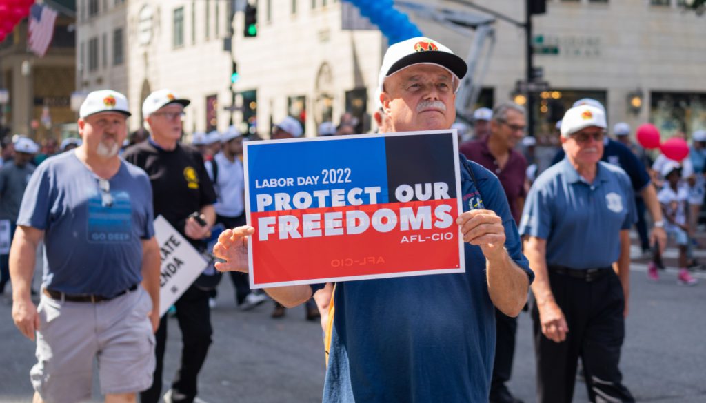 New York City workers celebrating the annual Labor Day Parade; union corruption concept